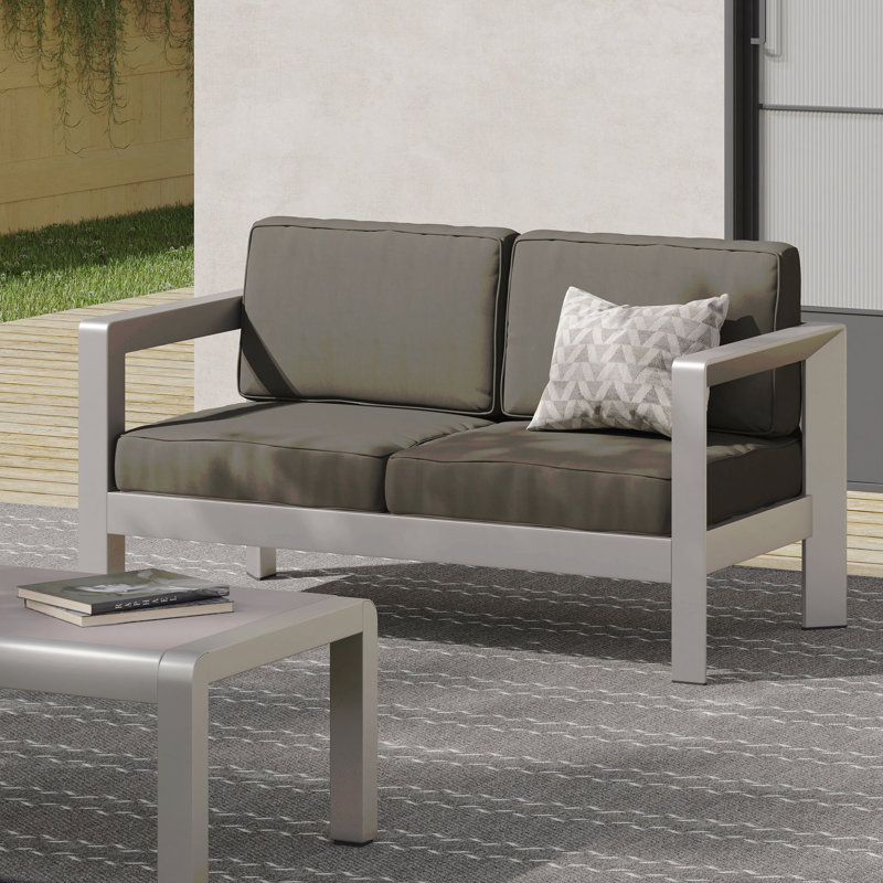 Causeuse d'extérieur luxueuse avec structure en aluminium durable et siège profond pour une détente confortable sur le patio