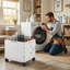 Chariot de transport robuste pliable à grande capacité de charge de 330 lb avec 4 roues tout-terrain pivotantes à 360 ° résistantes à l'usure, porte-gobelet pratique intégré et poches de rangement latérales-128590387