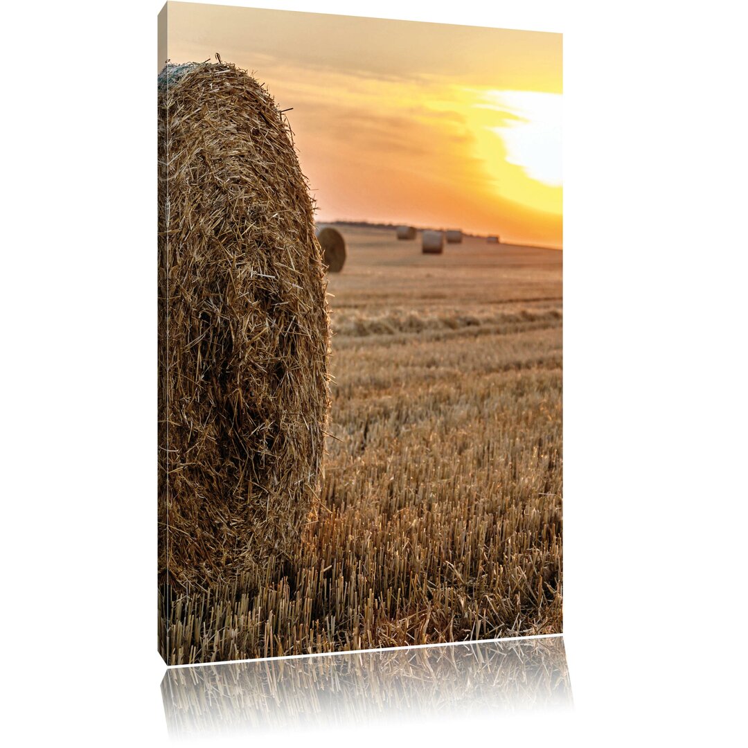 Leinwandbild Strohballen auf Feld, Fotodruck