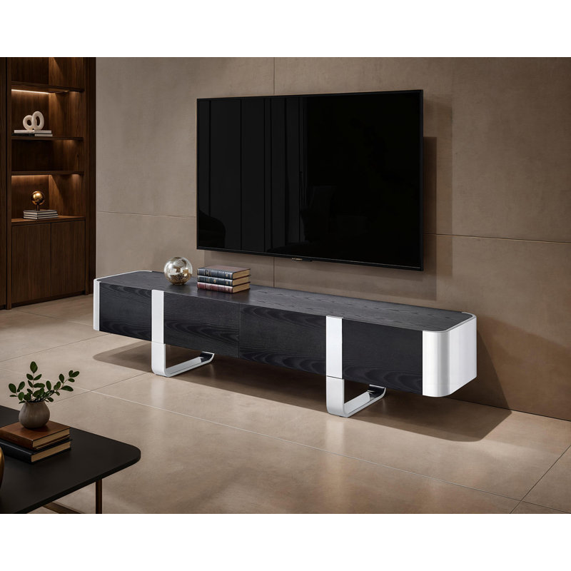 Meuble télé monobloc avec porte à fermeture douce, patins en acier inoxydable, noir et argent, Noir