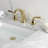 Kingston Brass Restoration Two-Handle 3-Hole Deck Mount Widespread Bathroom Faucet with Retail Pop-Up Drain