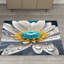 Tapis à poils doux exquis avec des motifs floraux délicats dans des tons terreux pour une pièce décorative chaleureuse et invitante-799695684