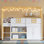 Lit mezzanine simple bas avec escalier, tablettes de rangement, armoires et lumières DEL, blanc / naturel