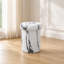 Table d'appoint sculpturale MGO de style sculptural avec table d'appoint ronde et polyvalente pour l'extérieur