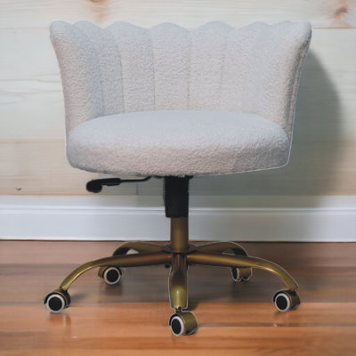 Aniyjah Upholstered Boucle Swivel Barrel Chair