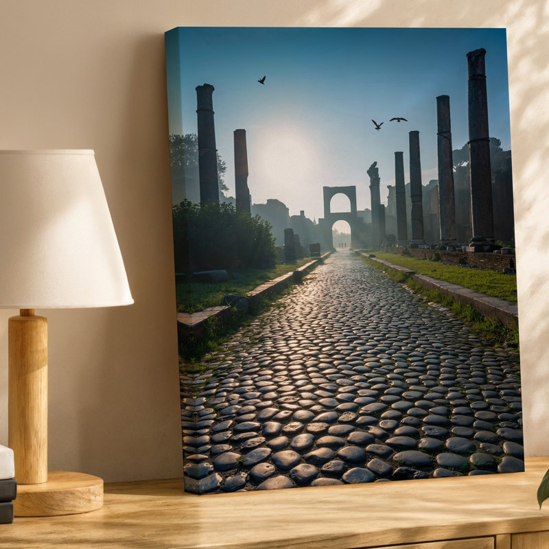 Toile, un chemin pavé s'étire jusqu'à la distance menant à un art mural, ancienne arche encadrée par de grandes colonnes patinées, art mural