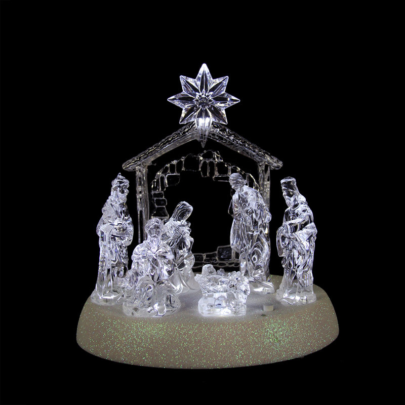 Crèche de noël avec une famille saint-siège