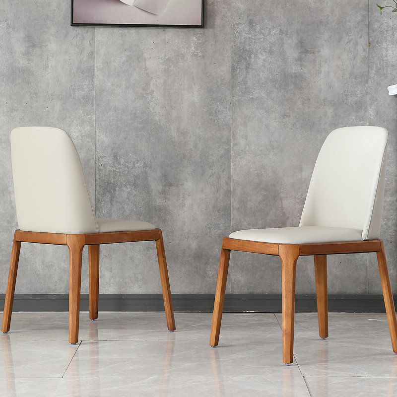 2 chaises de salle à manger grises au look moderne avec cuir PU, pieds en bois et coussin de velours particulier