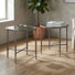 Ensemble de 2 tables de bout rondes en métal martelé en forme de X Lalia