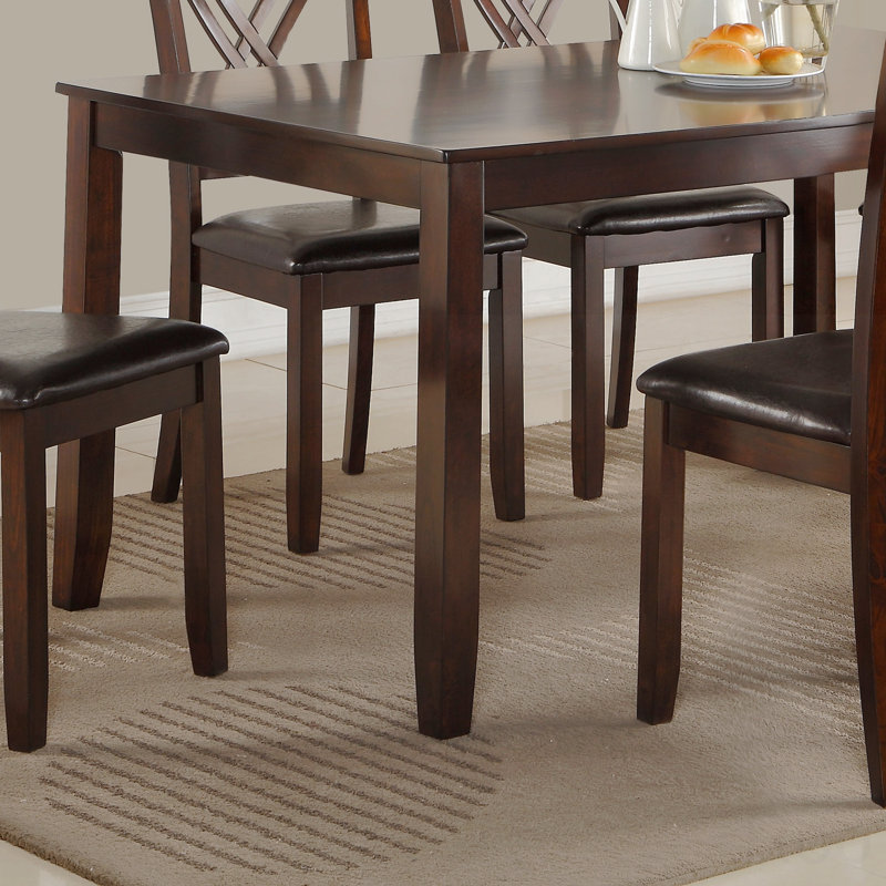 Table rectangulaire avec chaises rembourrées en PU