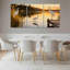 Ensemble de 3 tableaux sur toile tendue représentant un héron blanc au coucher du soleil-382043810