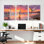Ensemble de 3 tableaux sur toile tendue représentant un héron au coucher du soleil