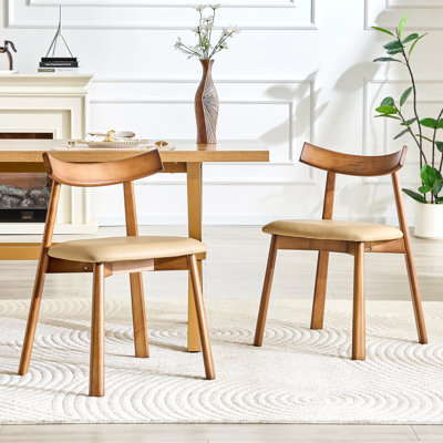 Chaises de salle à manger en bois massif avec coussins en polyuréthane et dossiers incurvés ergonomiques pour une assise confortable