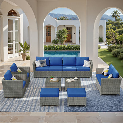 Ignatz 8 Piece Rattan Sectional Seating Group with Cushions