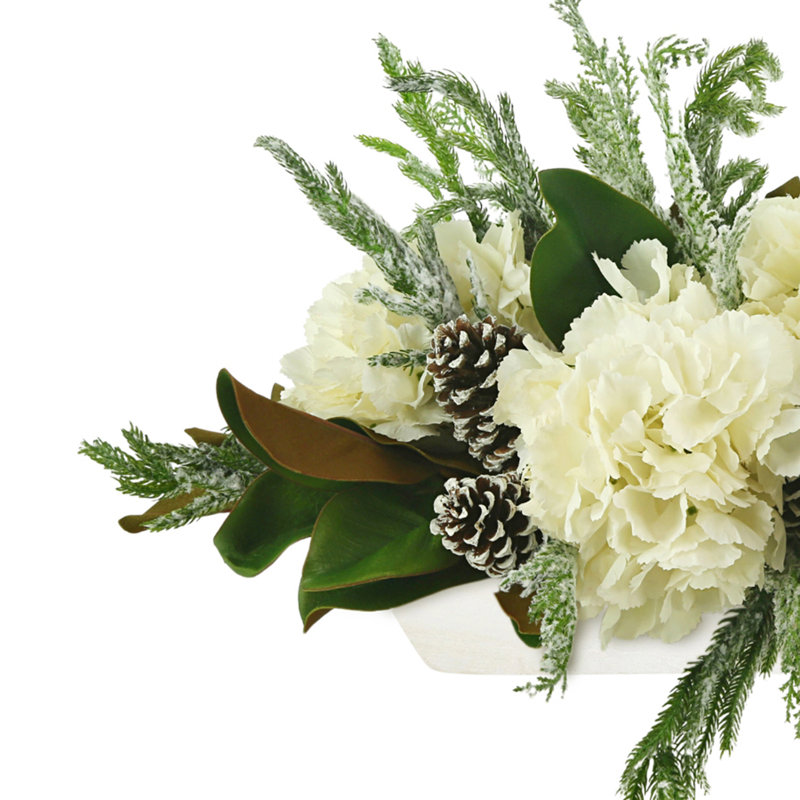 Snowy Holiday Arrangement with Hydrangeas, Magnolia Leaves and Pinecones