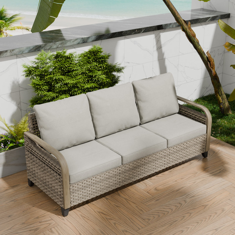 Canapé d'extérieur en osier de 77,6 po avec coussins Sunbrella® Jahtavious, Gris