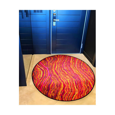 Tapis décoratif tissé à motifs en jaune, rose et orange