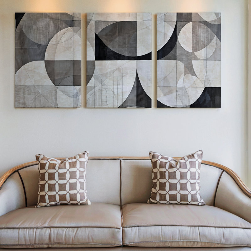 Ensemble exclusif de 3 toiles panoramiques modernes à motifs géométriques circulaires gris, noirs et crème, idéal pour décorer un salon, une chambre ou un bureau.