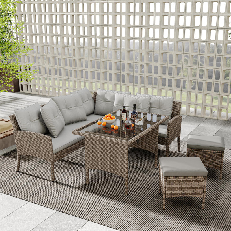 Pizano 7 - Person Patio Dining Set with Rectangular Table , Cushions Included, Beige, Brown