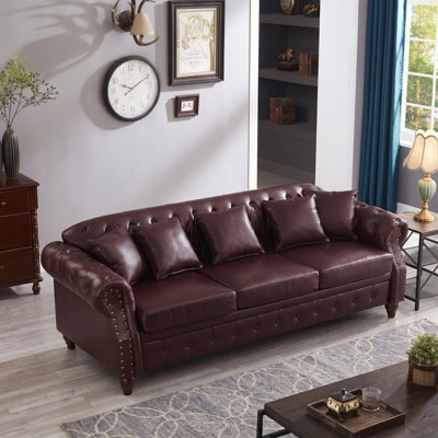 Chesterfield 85.8" W x 32" D x 30.7" H Faux Leather Tufted Cushion 3-Seat Storage Sofa