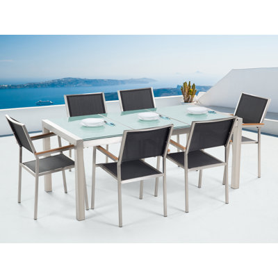 Lothen 6 - Person Patio Dining Set with Rectangular Table , Cushions Included