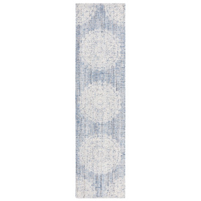 Ebony Hand Tufted Wool Cotton with Latex Floral Rug in Ivory/Blue