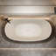 Baignoire autoportante orange de 57 pouces en pierre de résine à surface solide, murs isolés, usure, conception spacieuse avec baignoire relaxante non perméable