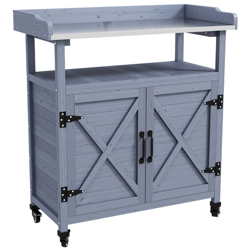 Banc de rempotage extérieur gris. Bois avec compartiment de rangement. Surface de travail en aluminium. Roues en caoutchouc pour un mouvement pratique. Rouille. Pour le jardinage des fruits. Rangement pour banc l 32,81 po x P 16 po x H 37,5 po.