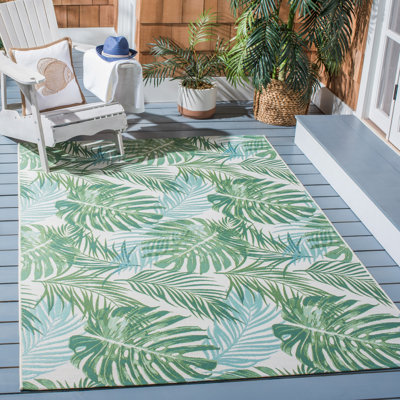 Tapis intérieur / extérieur à motif floral vert / bleu sarcelle Ivanna
