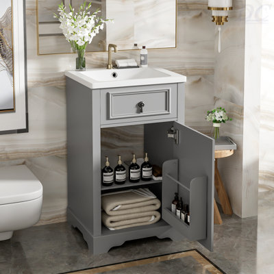 Meuble-lavabo de 20 pouces avec lavabo en céramique, porte à fermeture douce, tablette réglable et support de rangement fixé à la porte - idéal pour les petites salles de bain