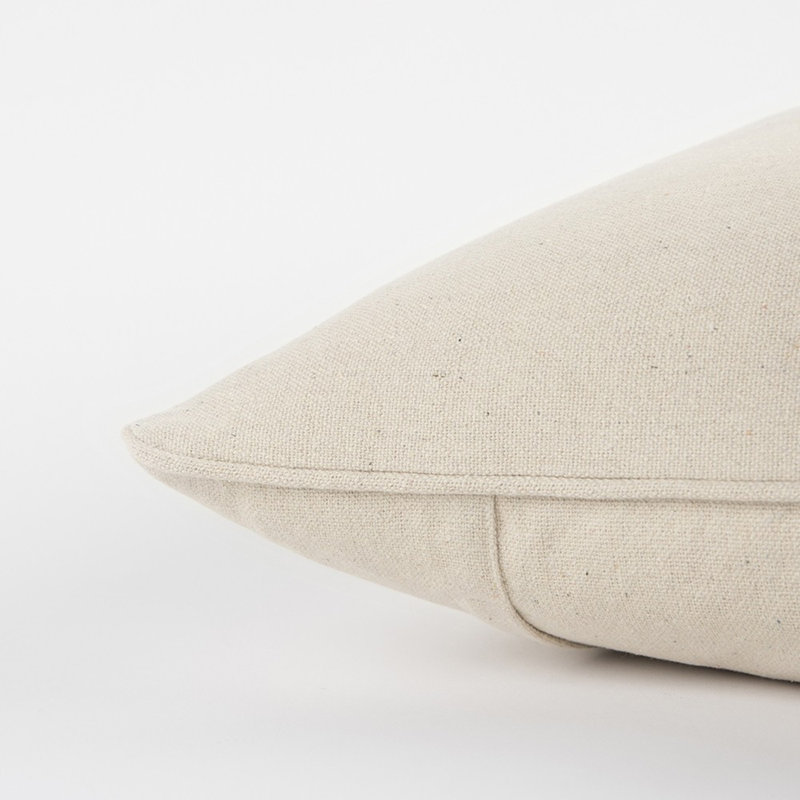 Coussin décoratif en toile grise et crème