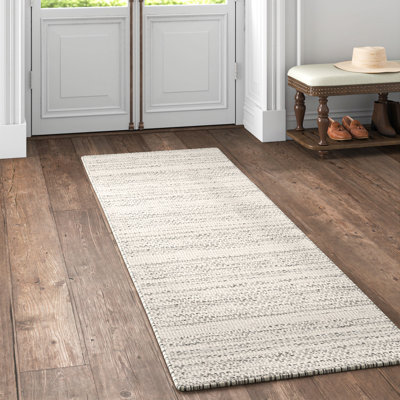 Tapis en laine crème et noir à motif de chevron tissé à plat Sylvie