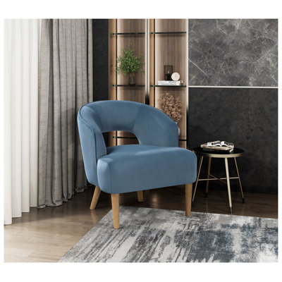 Chaise d'appoint contemporaine en velours bleu avec pieds en bois massif et siège à ressorts ensachés