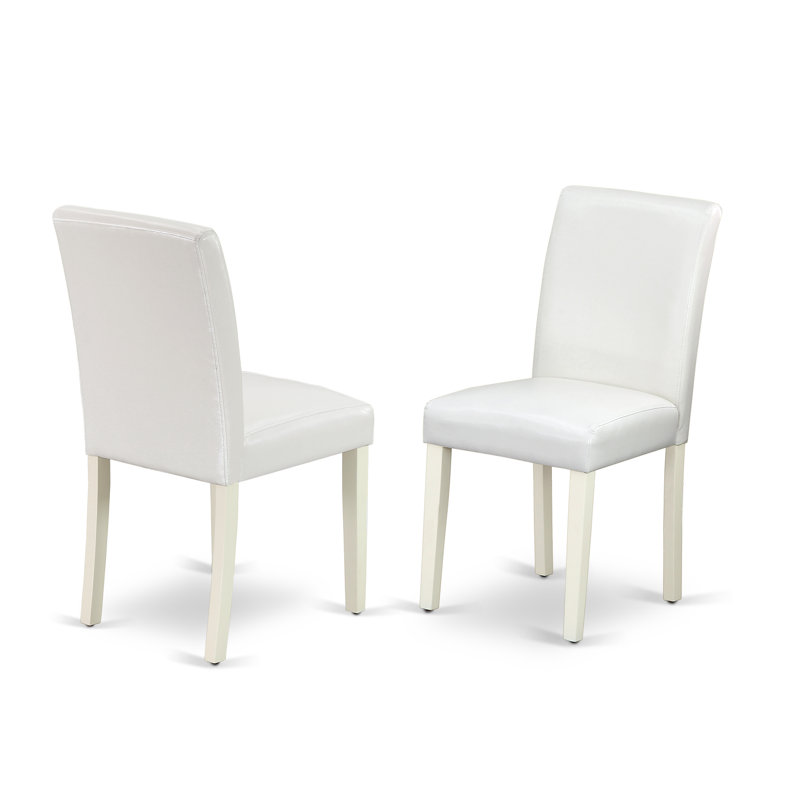 L'ensemble 7 pièces comprend une table rectangulaire en ciment et 6 chaises rembourrées en similicuir blanc - Lin brossé blanc