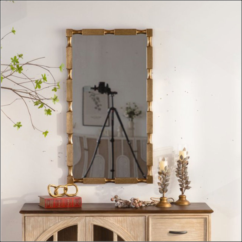 Miroir mural doré