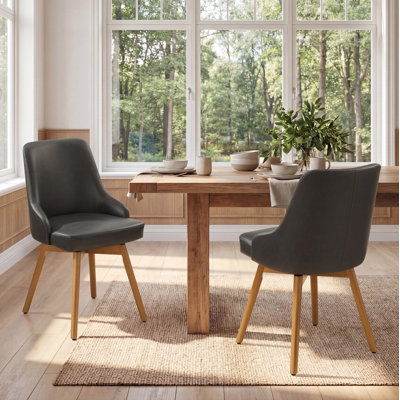 Anagnos 20.08"Seat Height Mid-Century Modern Swivel Faux Leather Upholstery Dining Side Chair