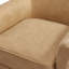 Fauteuil d'appoint en similicuir brun pivotant à 360°, dossier arrondi, surpiqûres décoratives, coutures passepoilées, assise à ressorts, coussin d'assise amovible, patins de sol, aucun assemblage requis.