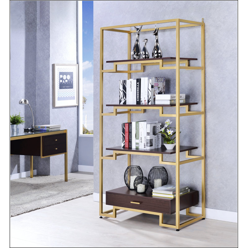 Bibliothèque en verre transparent et finition dorée