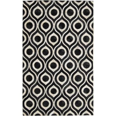 Area Cowhide Geometric Area Rug in Black/Cream