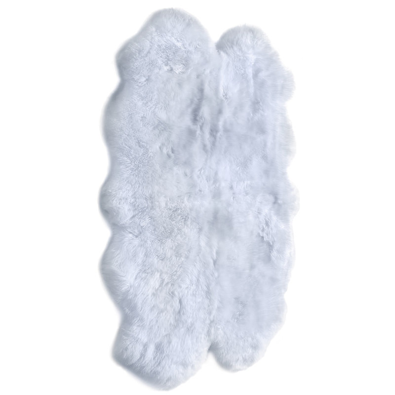 Celestia Solid Colour Quad Duck Egg Blue Sheepskin 105cm X 160cm Rug