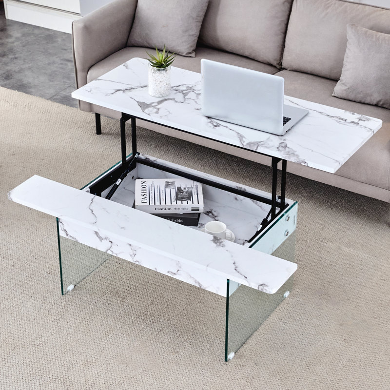 Table basse moderne à motif de marbre blanc. Plateau relevable. Pieds en verre trempé. Rangement abondant. Idéal pour le salon et le bureau. Différentes couleurs offertes. Table polyvalente facile à assembler avec