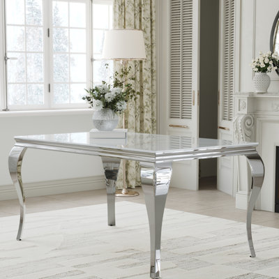 Modern Glass Dining Table With Polished Stainless Steel Legs