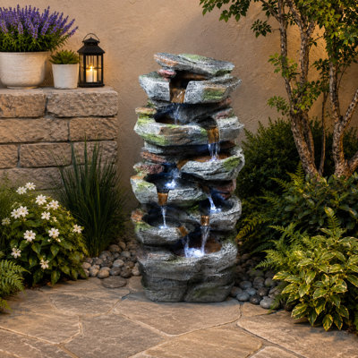Fontaine cascade de cascade de roches à niveaux avec lumières DEL, décoration extérieure de jardin en pierre