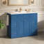 Meuble-lavabo bleu marine 48 po avec lavabo en céramique - 6 tiroirs (3 de chaque côté), tiroir central rabattable, portes doubles à fermeture en douceur, porte-serviettes latéral réversible, poignées argentées, panneau de fibres à densité moyenne