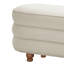 Banc de rangement ovale à caissons, taille unique, avec pieds boules en bois, couleur crème.