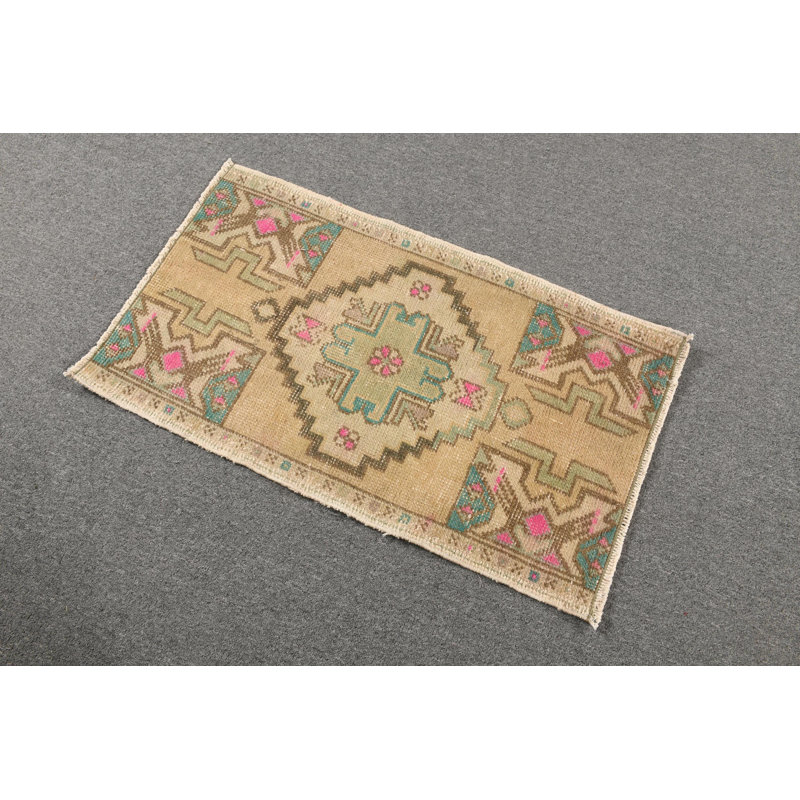 Handcrafted Anatolian Carpet: Small Vintage Turkish Wool Rug with Geometric Designs
