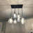  8 - Light Dimmable Cluster Pendant With Matte Black Finsh