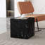 Table basse en MDF noir avec texture luxueuse, décor de salon parfait.