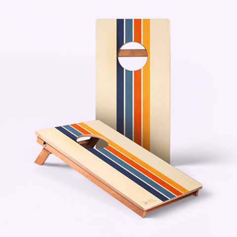 Retro-striped cornhole game set.