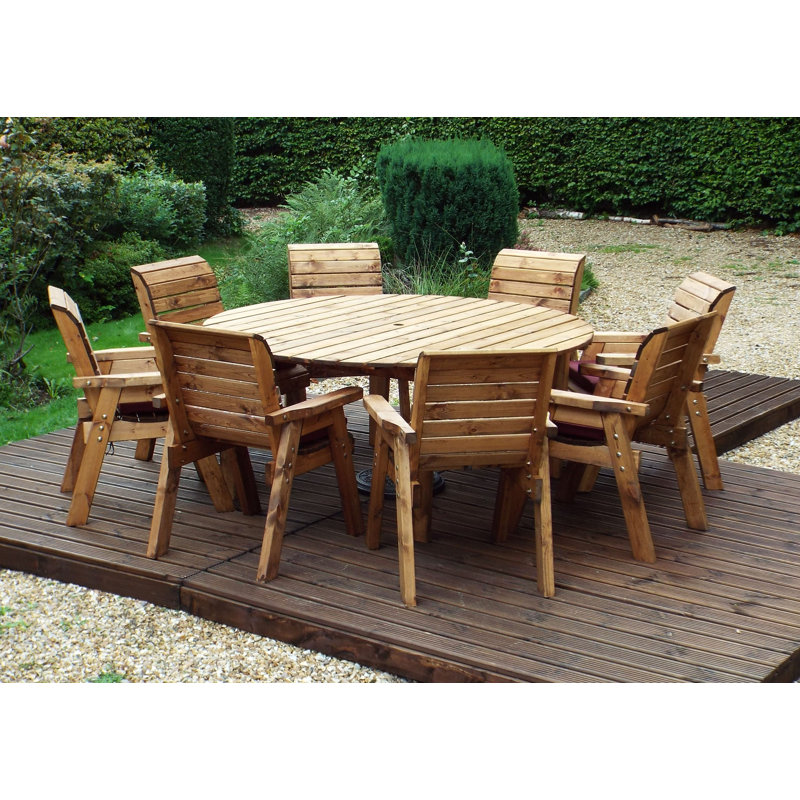 Farris 8 - Person Wood Patio Dining Set with Round Table , Cushions Included, Burgundy